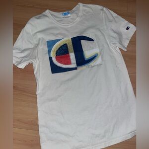 White multicolored champion logo shirt